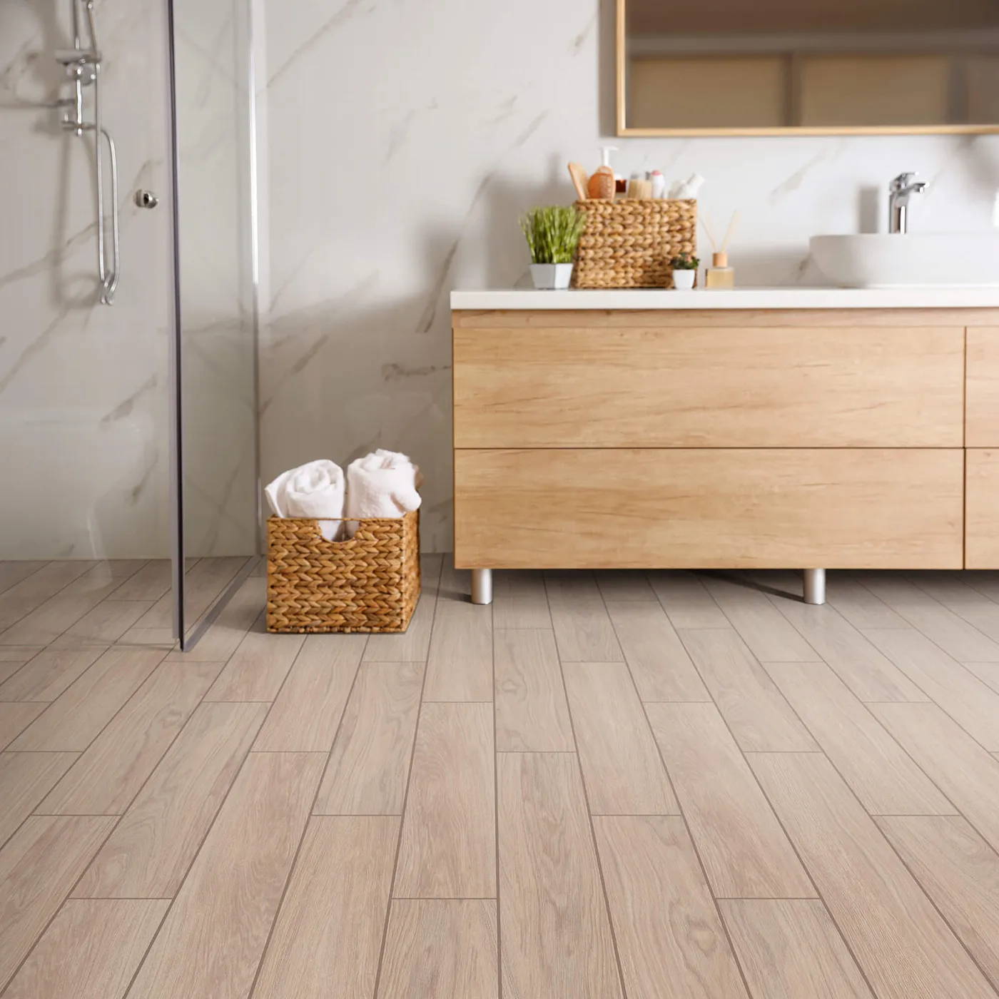 Moonstruck-401TS-00150-Ardor-6x36-RM-H Shaw Floors tile with a light wood look, in a modern bathroom | Tom January Floors
