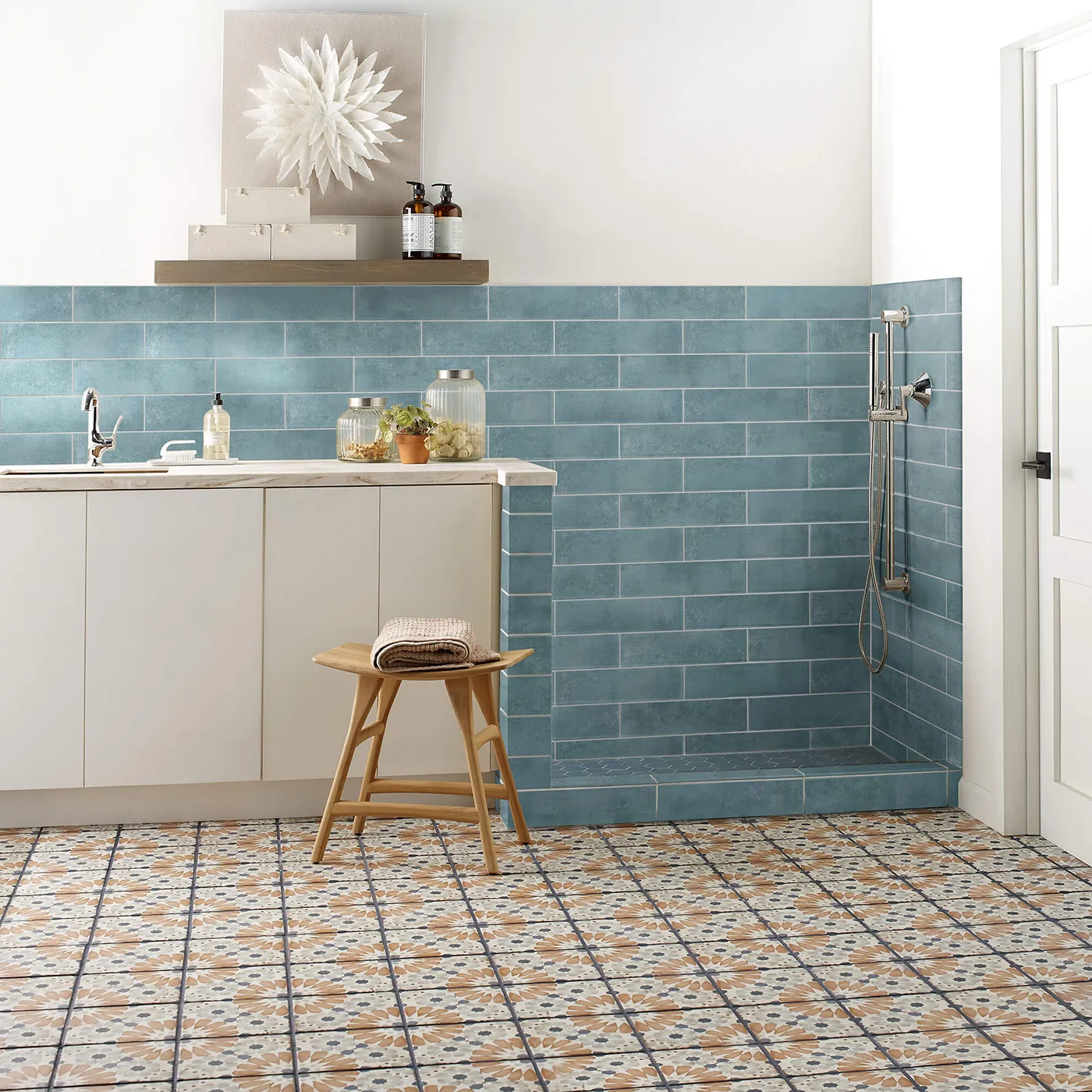 Noble-306TS-00450-Mint-3x12-RM-V Mint blue subway tile on the wall and multi-colored patterned tile on the floor | Tom January Floors