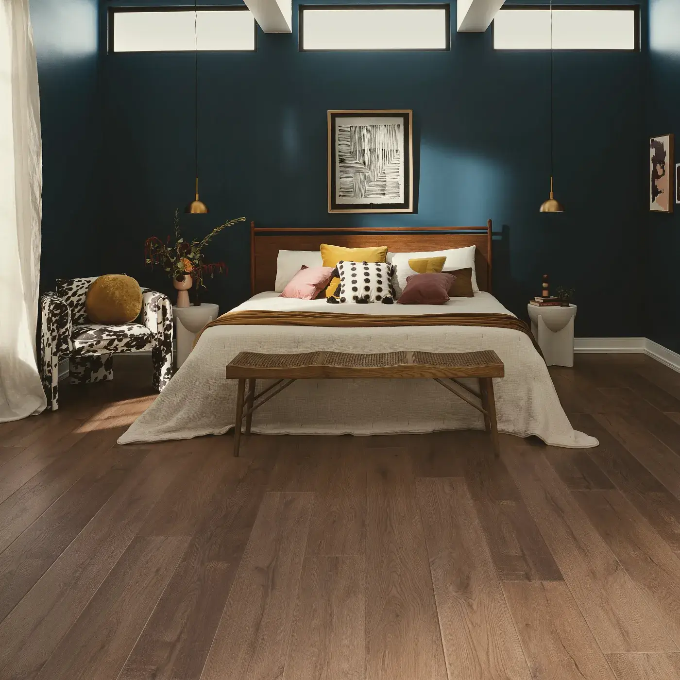 VV810_04027_ROOM COREtec Luxury Vinyl in a medium brown wood tone in a bedroom | Tom January Floors