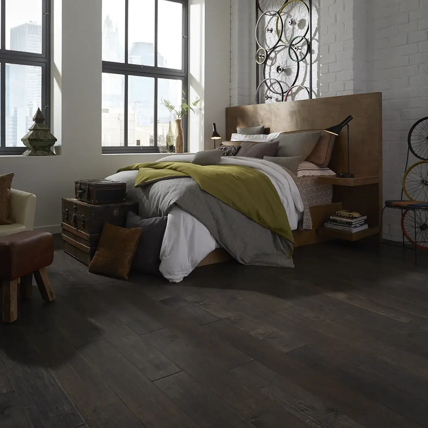 YukonMapleII-SW548-05002-Timberwolf-BedRm Dark hardwood in a modern bedroom with a large bed | Tom January Floors